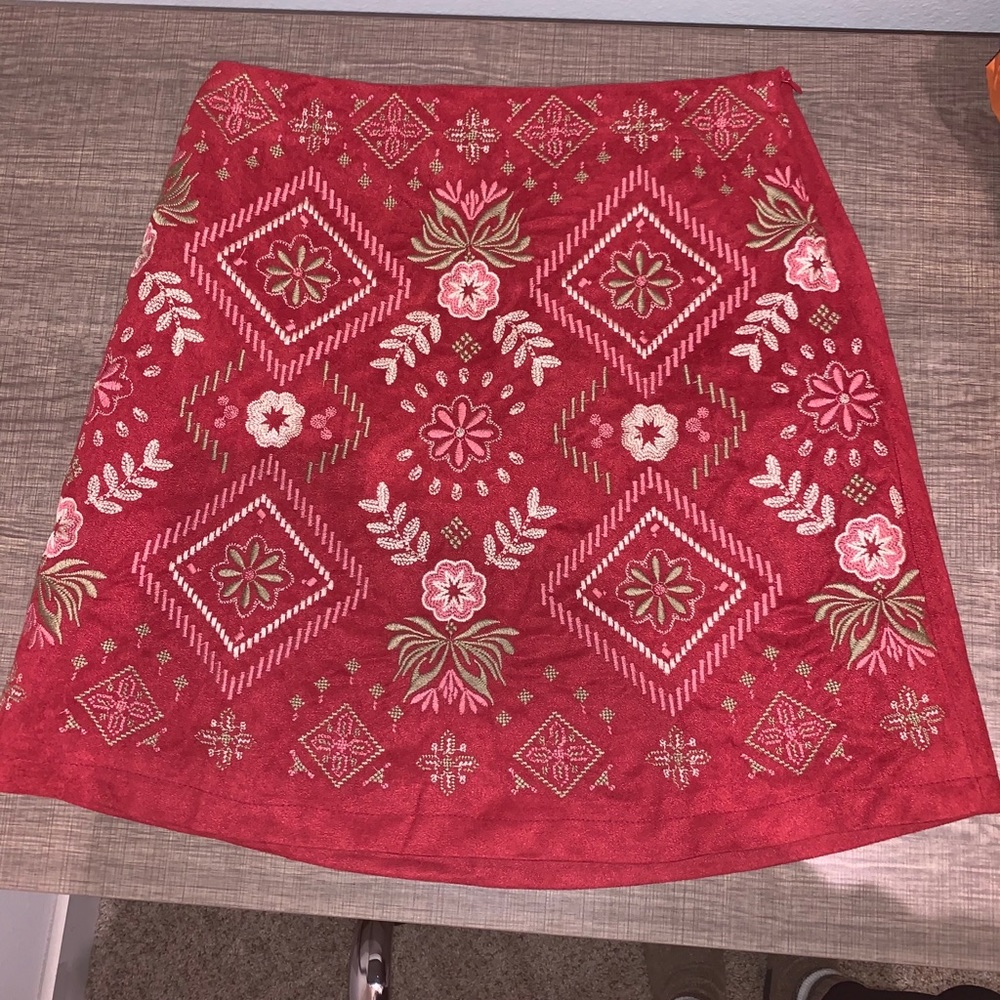 red embroidered skirt